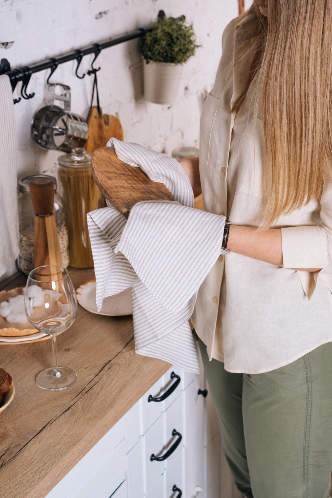 Wiping down a wooden kitchen counter